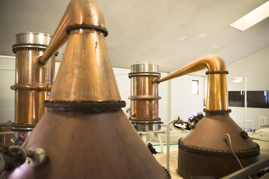 two copper pot stills for whisky