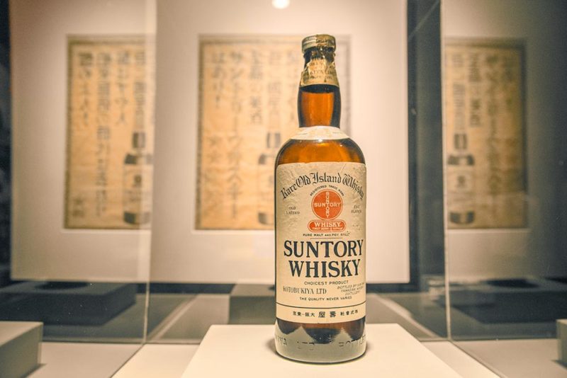 A bottle of Suntory whiskey on display