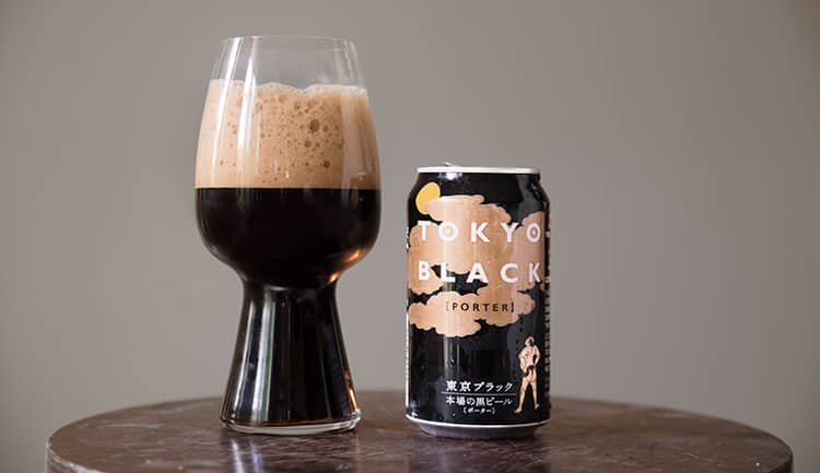 a dark Japanese beer and a glass