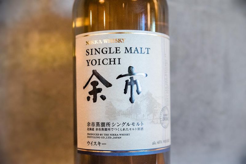 a label of Japanese whisky with a grey background