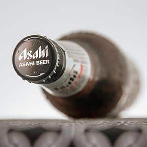 a cap from a bottle of Asahi beer