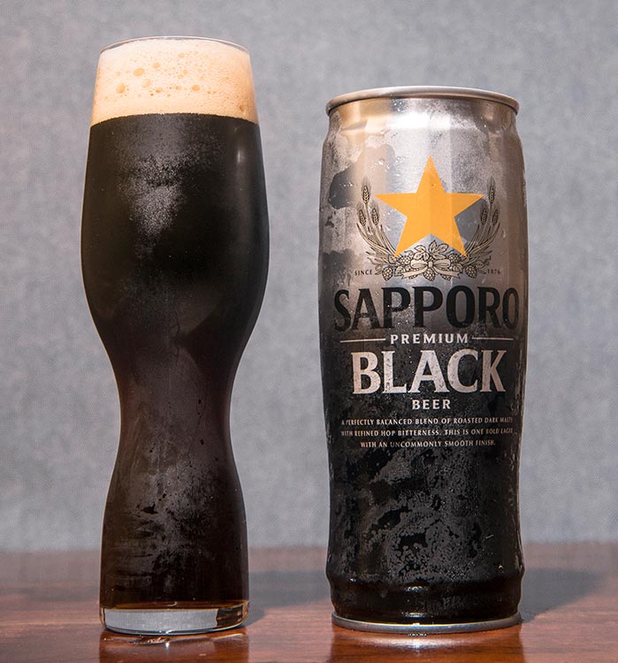 a can and glass of Japanese black beer