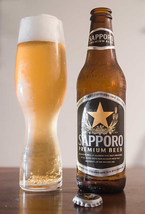 a bottle of Sapporo Premium beer, the original Japanese beer brand