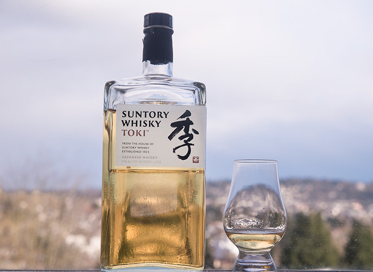 a bottle of Japanese whisky and a tasting glass