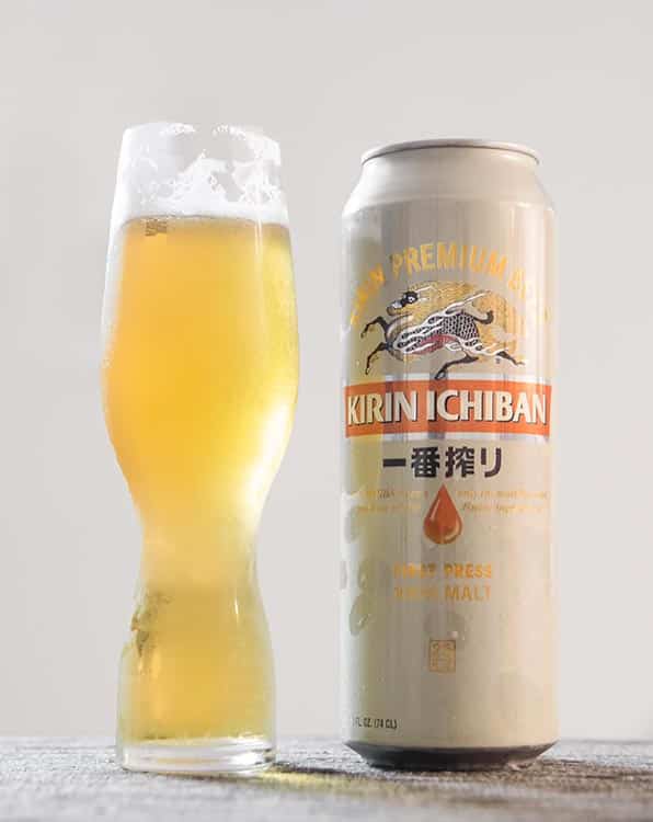 a can of Kirin beer and pilsner glass