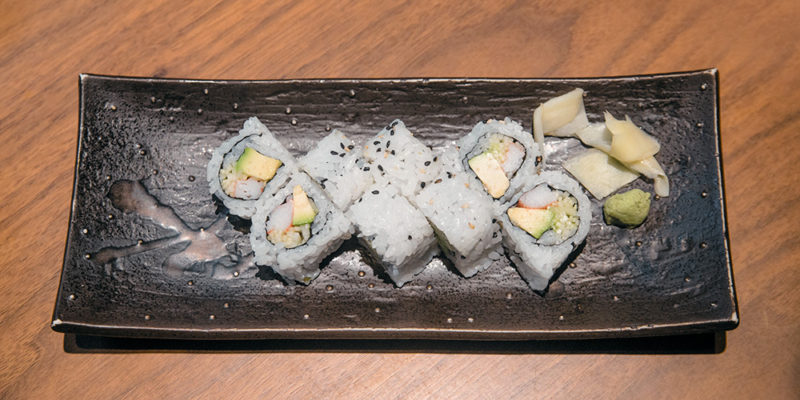 an eight piece crab sushi roll