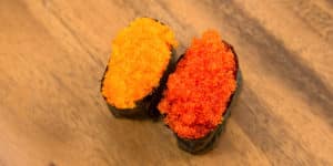 two pieces of fish roe sushi