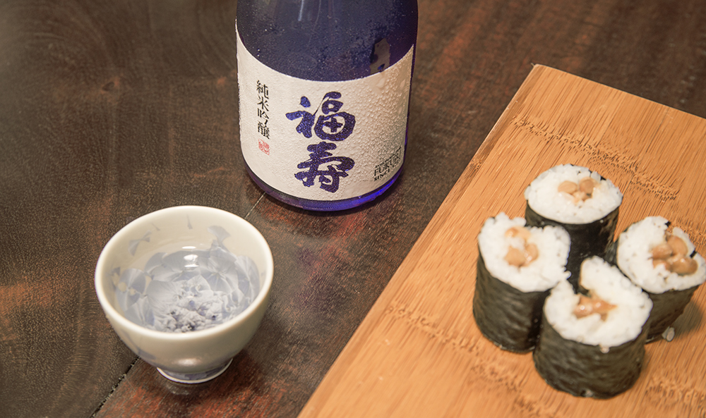 a bottle of Kobe sake and natto