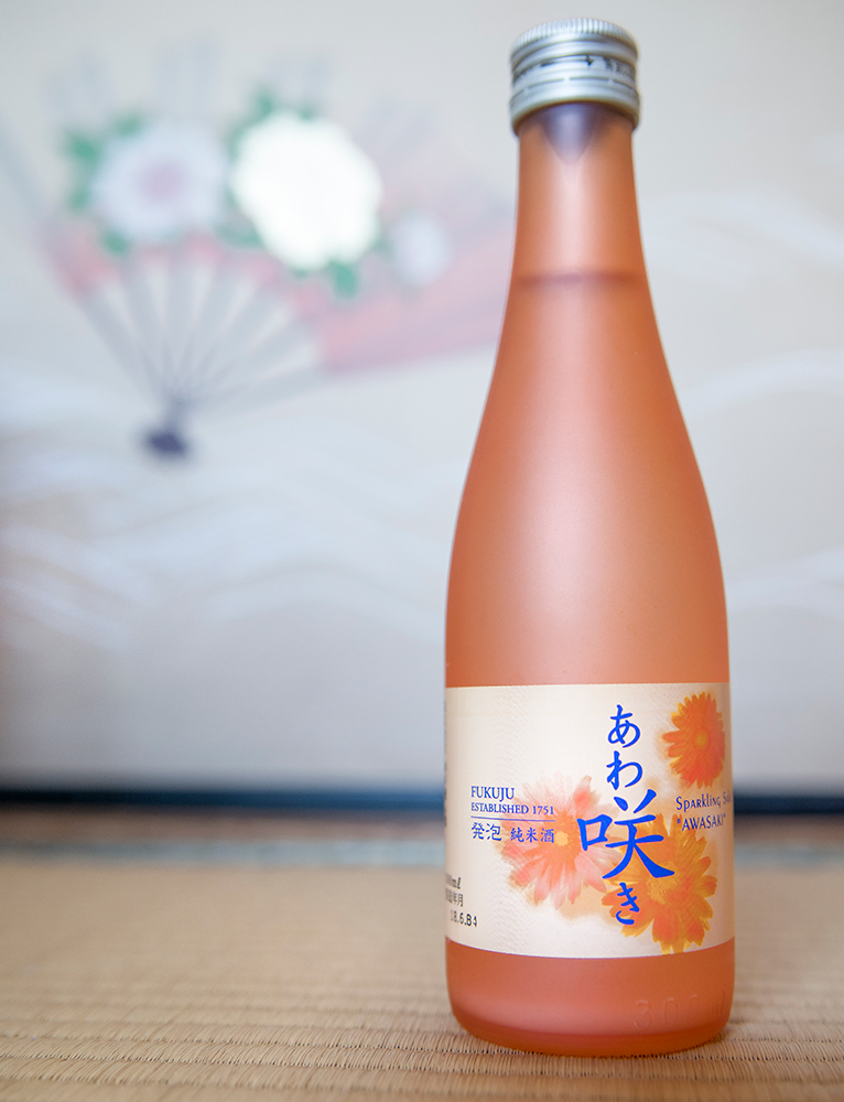 a pink colored sparkling sake from Kobe