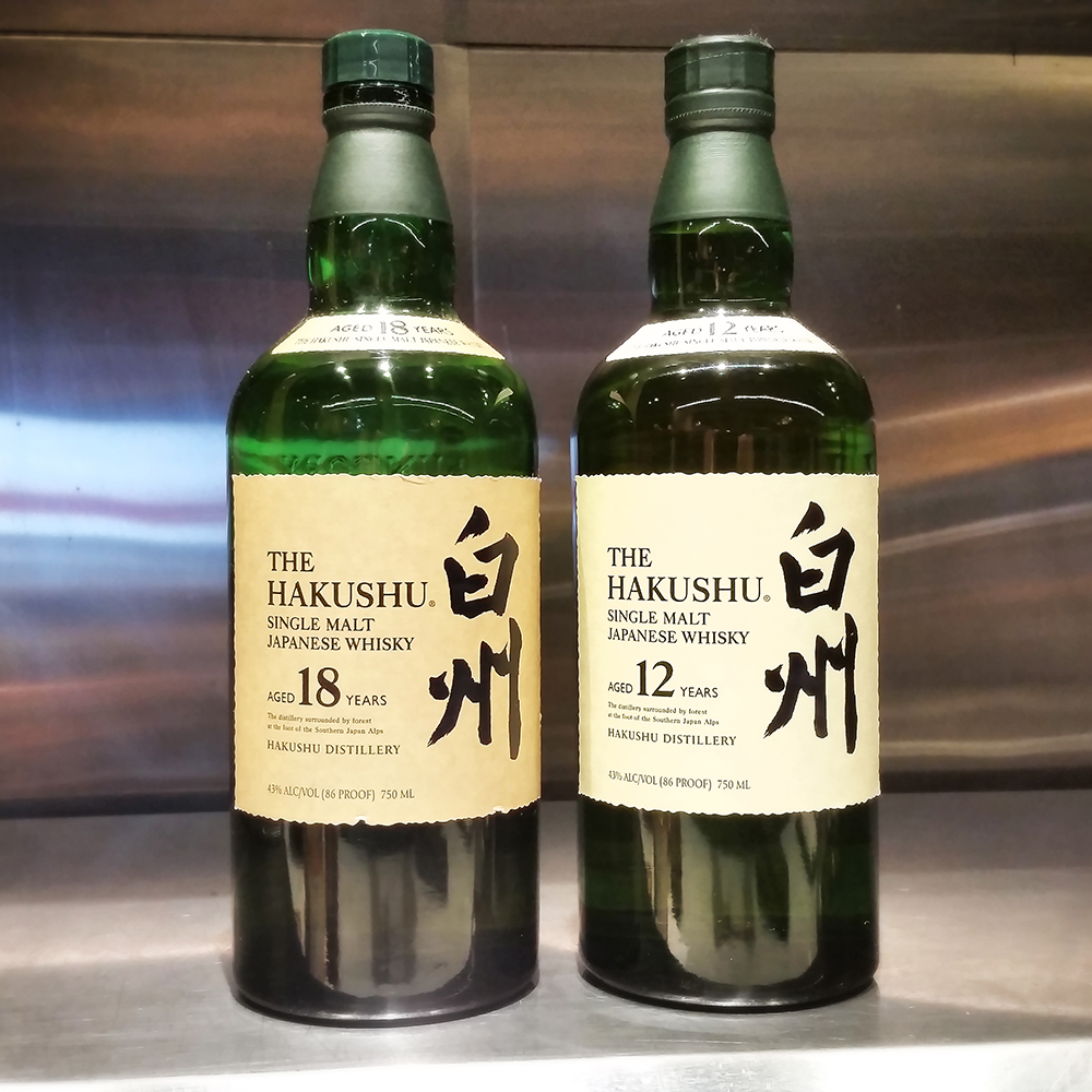 two bottles of Hakushu whisky