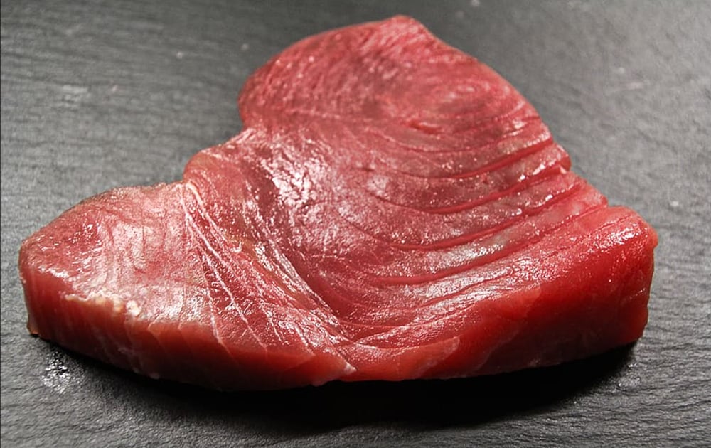 raw bigeye tuna loin for sushi