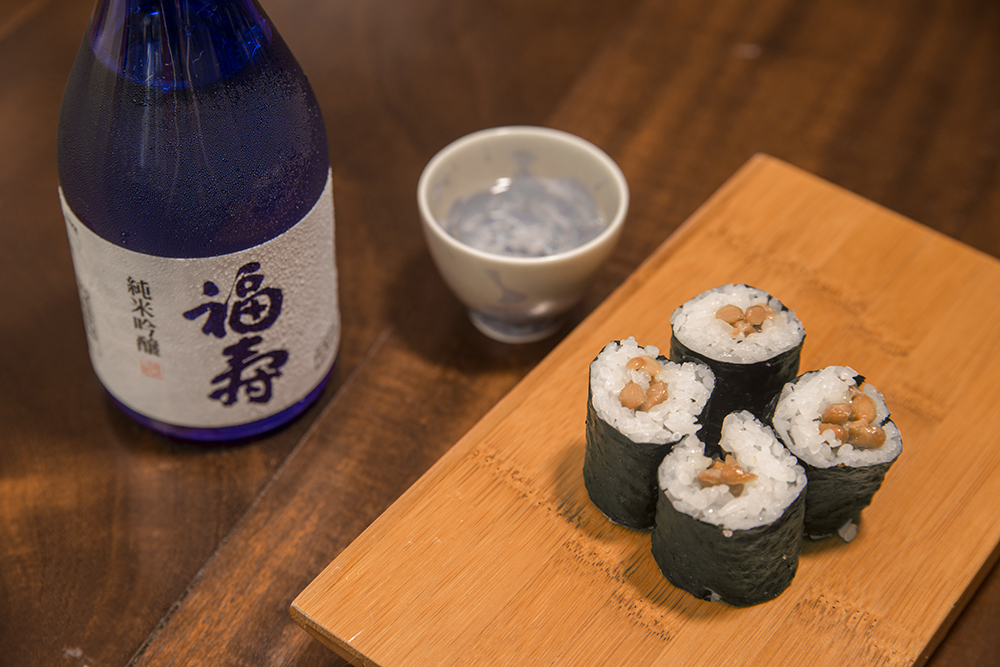 natto sushi and a bottle of sake
