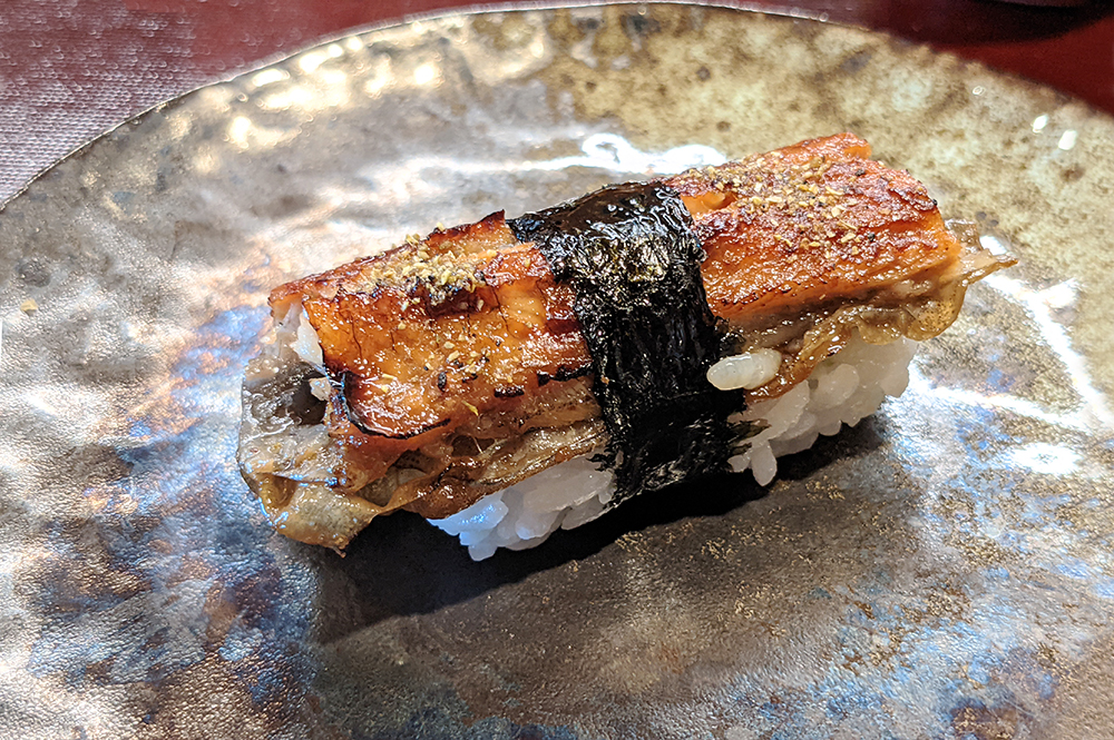 a piece of unagi sushi