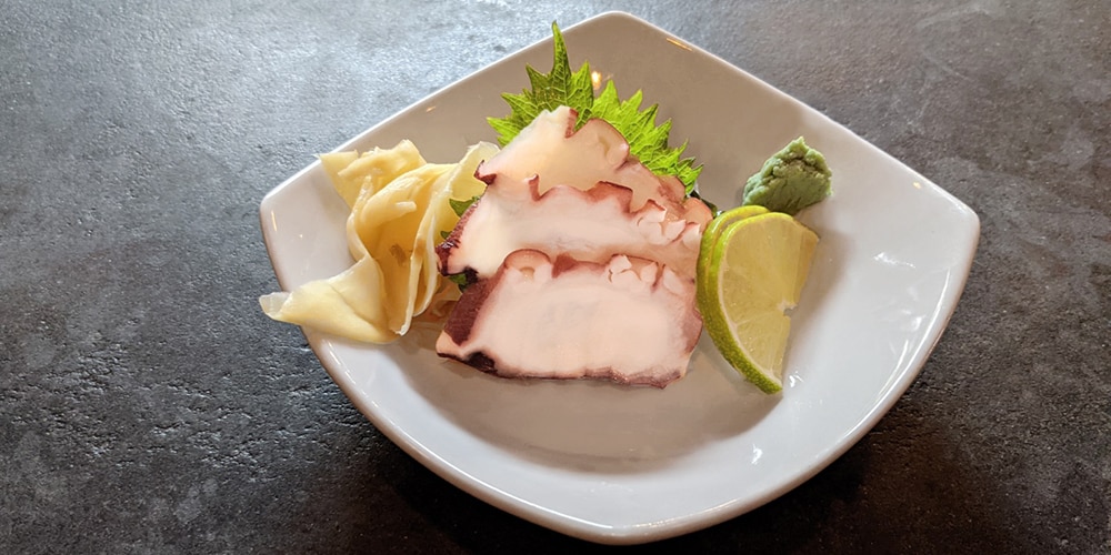 thinly sliced octopus sashimi