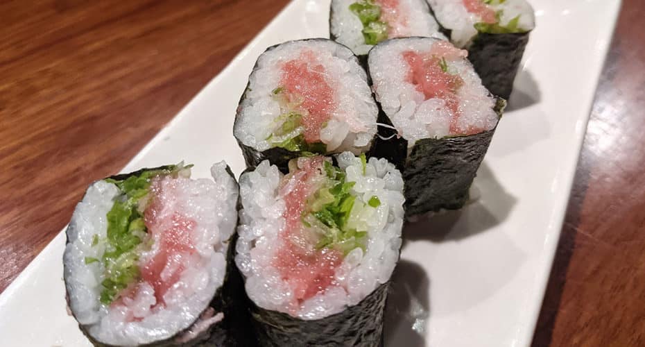 a tuna and green onion sushi roll