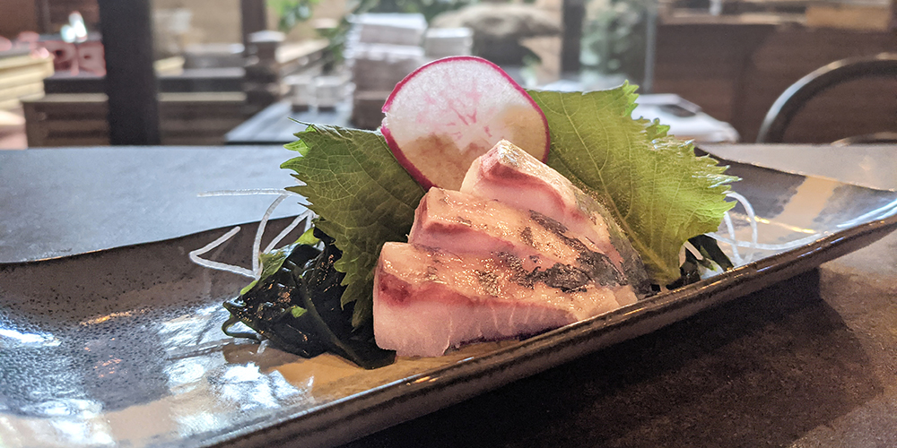 three slices of shima-aji sashimi