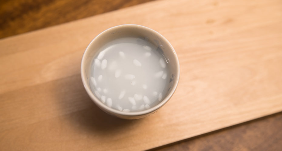 a cup of amazake rice drink
