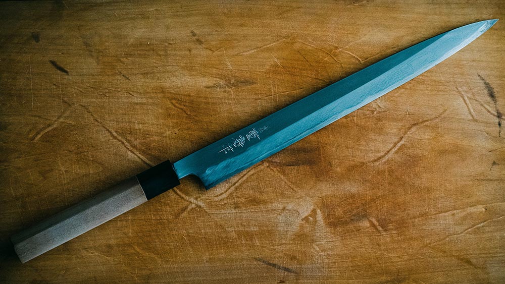 a very long, traditional sashimi slicing knife
