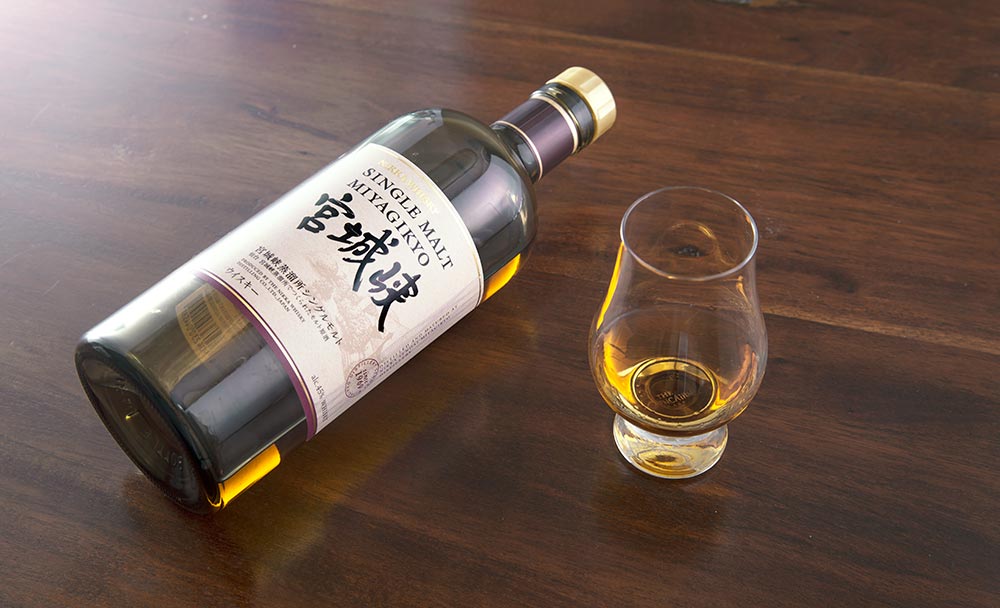 a bottle of Nikka whisky and a snifter