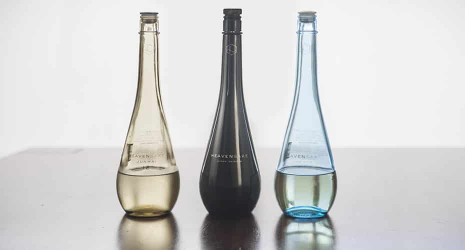 three colorful bottles of nihonshu