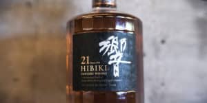 a full bottle of Hibiki 21 Japanese whisky