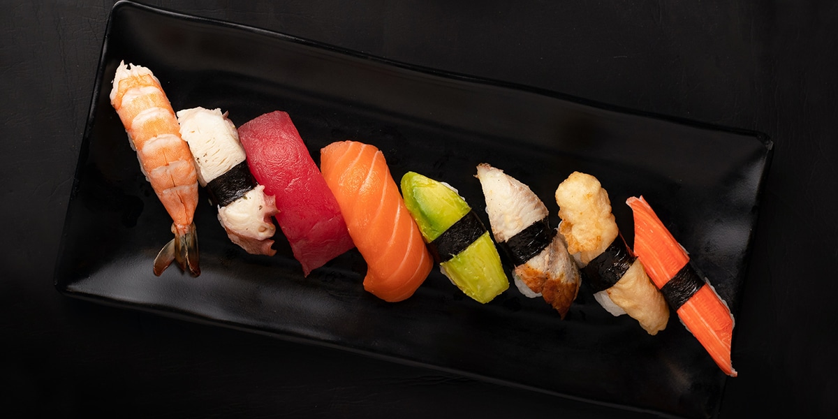 eight colorful pieces of nigiri sushi