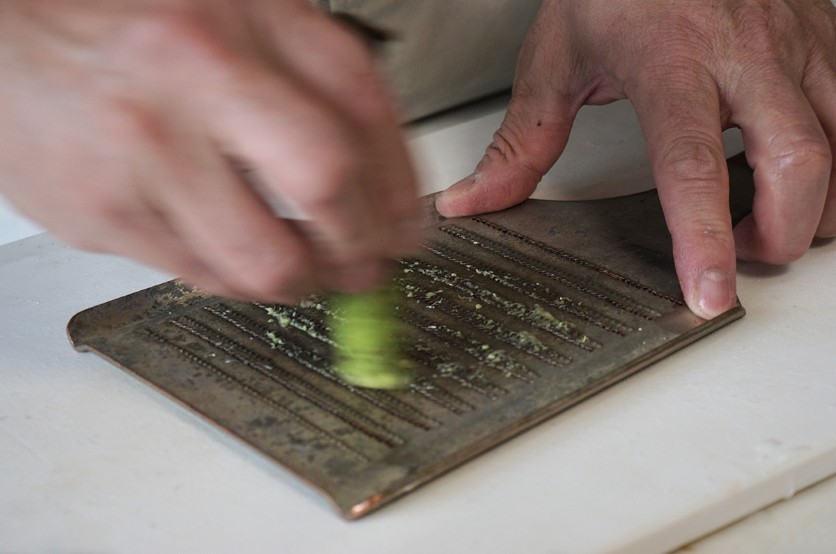 grating wasabi into paste